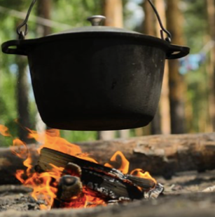 Wild Things Ranch Cowboy Potatoes over fire in Sonoma County, California